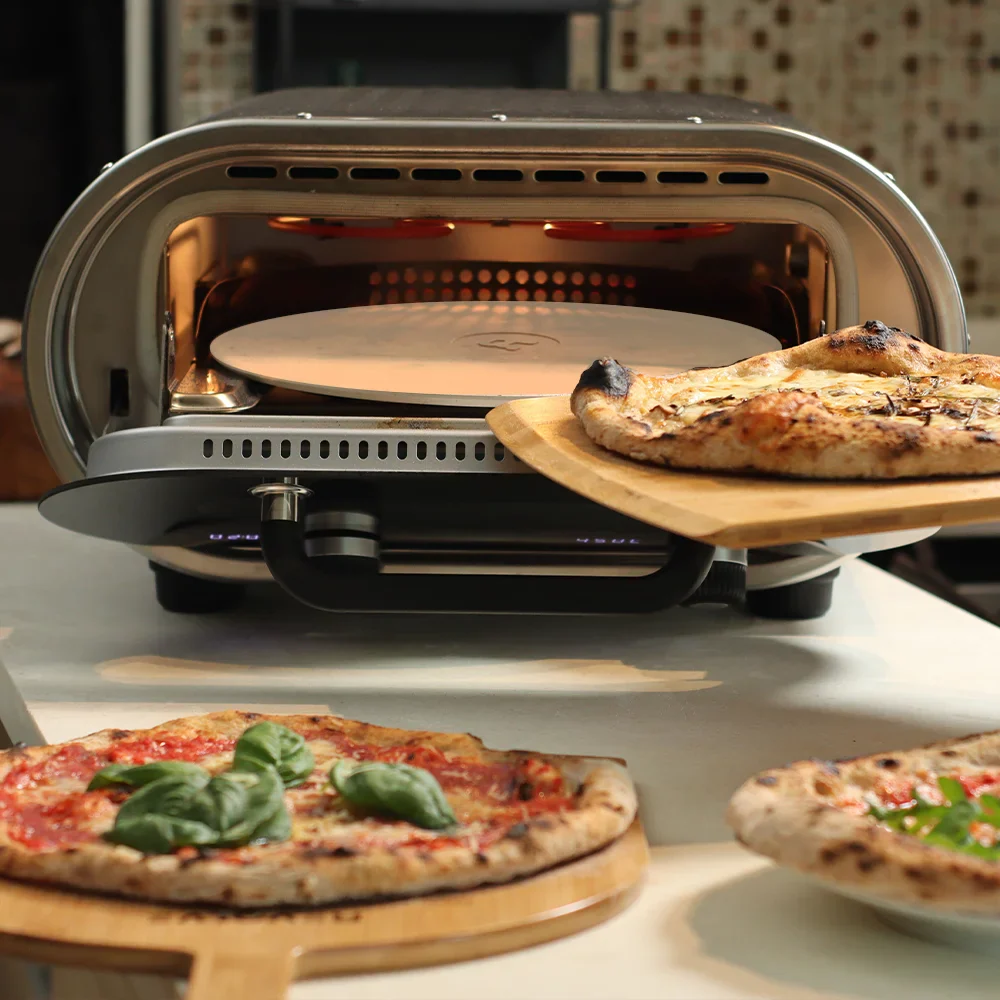 Revolve Elektro-Pizzaofen mit 33 cm großem automatischem Drehteller aus Cordierit - bis 450 °C für Indoor & Outdoor von Revolve